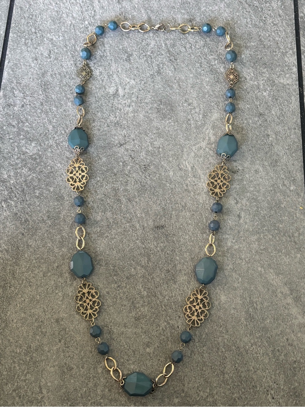 Blue Faceted Bead Necklace with Filigree Accents